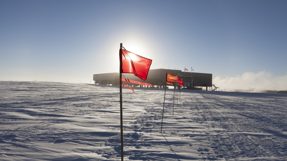 Marked path from the IceCube lab to the South Pole Station in Summer. (Credit: Freija Descamps/NSF, 2011) Marked path from the IceCube lab to the South Pole Station in Summer. (Credit: Freija Descamps/NSF, 2011)